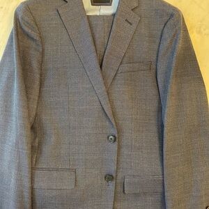 Two-piece penguin suit in blue. Coat is 40 regular and pants are 33/30.